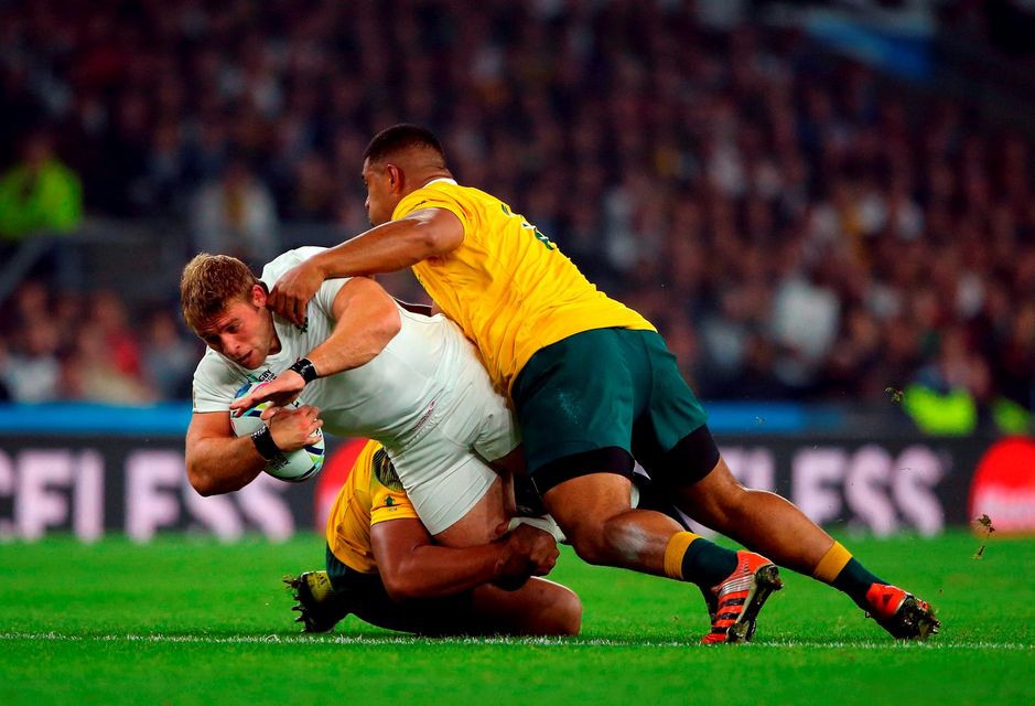 England's Tom Youngs gets tackled by Australia's Scott Sio (right) during the World Cup match at Twickenham Stadium, London. PRESS ASSOCIATION Photo. Picture date: Saturday October 3, 2015. See PA story RUGBYU England. Photo credit should read: Gareth Fuller/PA Wire. RESTRICTIONS: Use subject to restrictions. Editorial use only. No commercial use. No use in books or print sales without prior permission. Call +44 (0)1158 447447 for further information.
