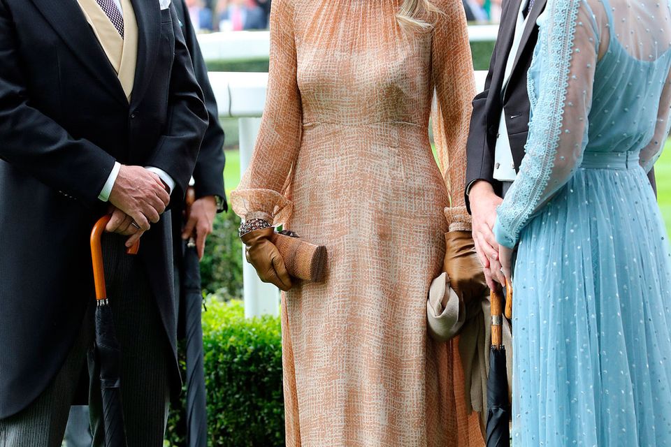 King Willem-Alexander of The Netherlands and Queen Maxima of The Netherland speak to Prince William, Duke of Cambridge and Catherine, Duchess of Cambridge  on day one of Royal Ascot at Ascot Racecourse on June 18, 2019 in Ascot, England. (Photo by Chris Jackson/Getty Images)