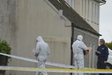 thumbnail: Officers from the Garda Technical Bureau carry out a search in Knockanure on Monday morning. 