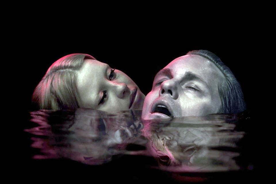 Moia Goth and Alexander Skarsgård in Infinity Pool