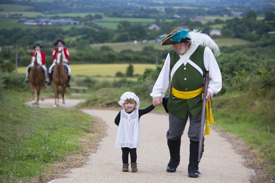 Pictured is re-enactor Ray Murphy wiht his granddaughter Emily