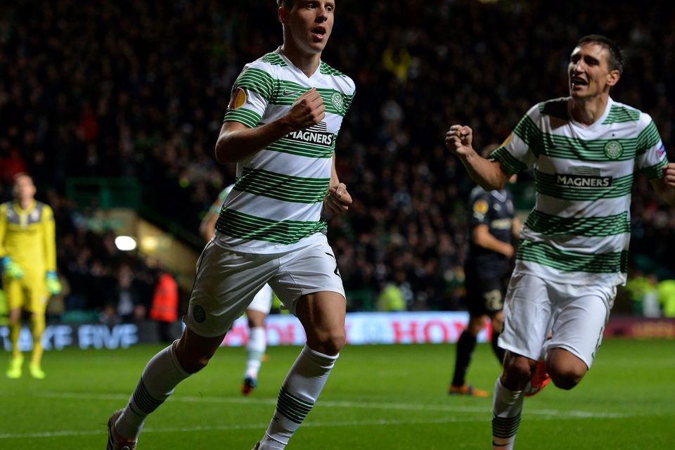 Stefan Johansen of Celtic celebrates scoring his goal with team mate Stefan Sceptic during the UEFA Europa League group D match between Celtic and Astra Giurgiu