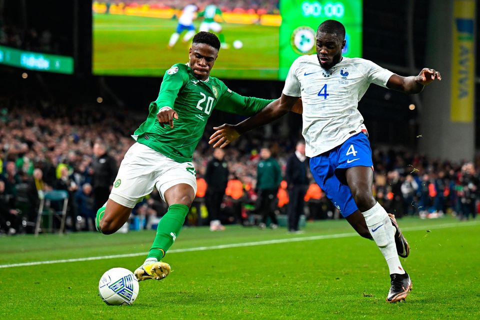 Ireland's Chiedozie Ogbene in action against Dayot Upamecano of France at the Aviva Stadium. Photo: Sportsfile