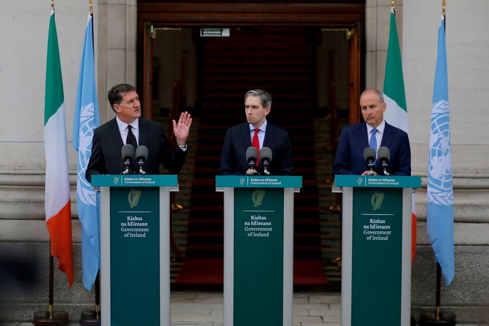 Eamon Ryan, Simon Harris and Micheál Martin announce the recognition of Palestine at a press conference outside Government Buildings in Dublin. Photo: Damien Storan/PA