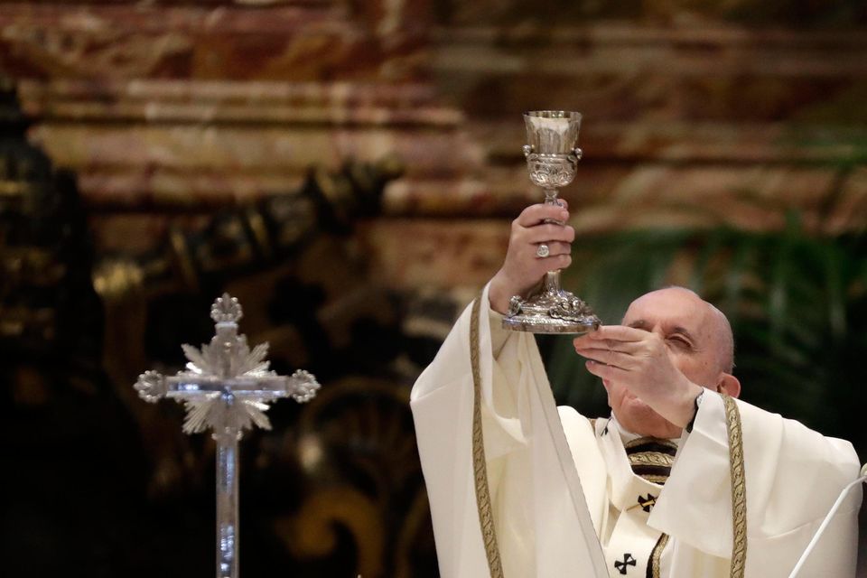 Pope Francis celebrates a Chrism mass inside St Peter's Basilica at the Vatican. During the mass, the pontiff blesses a token amount of oil that will be used to administer the sacraments for the year