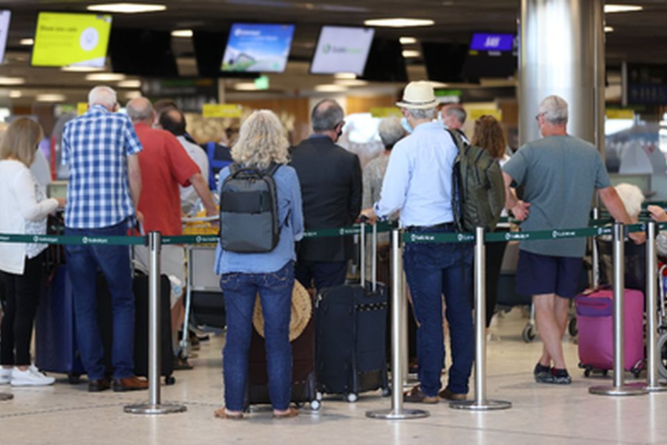Passengers queuing at Dublin Airport. Picture by Liam McBurney/PA