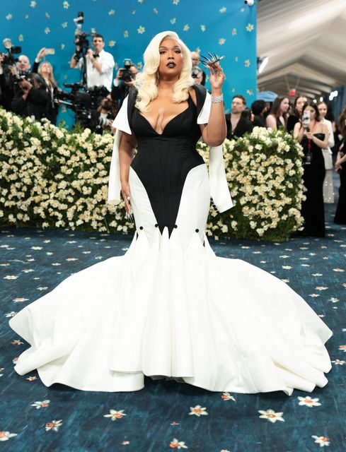 Lizzo poses during the Met Gala, an annual fundraising gala held for the benefit of the Metropolitan Museum of Art's Costume Institute with this year's theme 'Superfine: Tailoring Black Style,' in New York City, New York, U.S., May 5, 2025. REUTERS/Mario Anzuoni