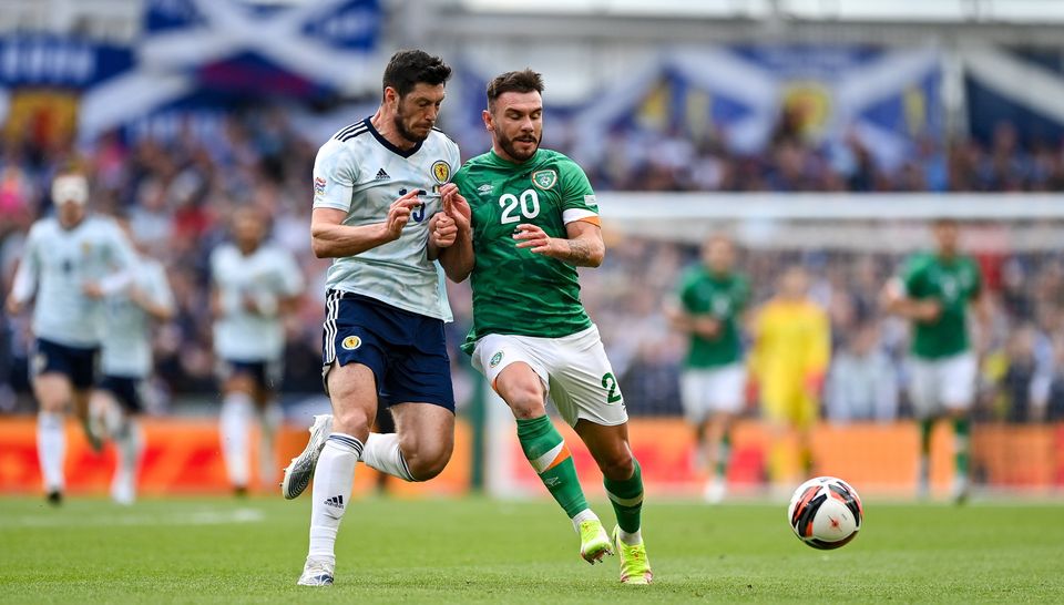 Ireland's Scott Hogan in action against Scott McKenna of Scotland during the UEFA Nations League B match in 2022. Photo: Seb Daly/Sportsfile