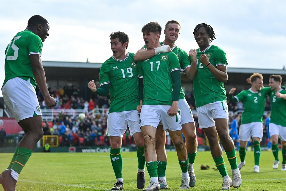 Johnny Kenny of Republic of Ireland, 17, celebrates with teammates after scoring their side's second goal during the Under-21 international friendly match between Republic of Ireland and Iceland at Turners Cross in Cork. Pic: Seb Daly/Sportsfile