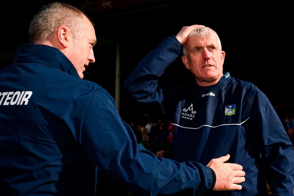 Tipperary manager Lima Cahill with his Limerick counterpart, John Kiely, after the game
