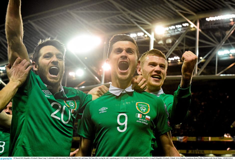 29 March 2015; Republic of Ireland's Shane Long, 9, celebrates with team-mates Wesley Hoolahan, left, and James McClean after scoring his side's equalising goal. UEFA EURO 2016 Championship Qualifier, Group D, Republic of Ireland v Poland. Aviva Stadium, Lansdowne Road, Dublin. Picture credit: David Maher / SPORTSFILE