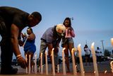 thumbnail: The Pugh and Elkins families gather while grieving the death of family members. Photo: Getty