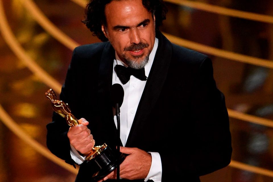 Director Alejandro Gonzalez Inarritu accepts his award for Best Director in The Revenant on stage at the 88th Oscars