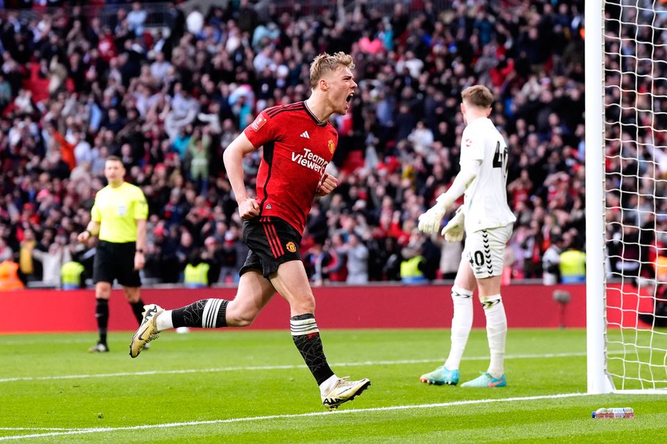 Manchester United's Rasmus Hojlund celebrates after scoring the winning penalty of the shoot-out during the FA Cup semi-final match against Coventry City at Wembley Stadium, London