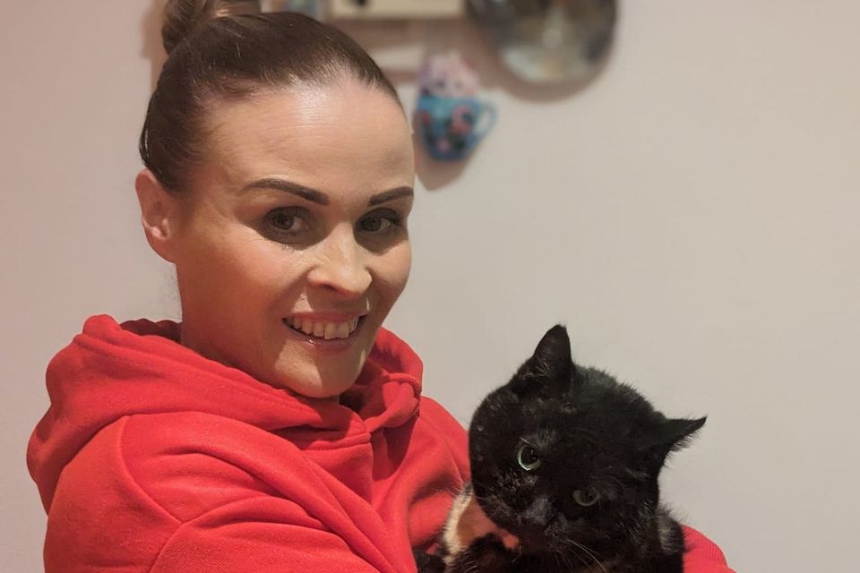 Ciara Derby and her cat Molly who she rescued