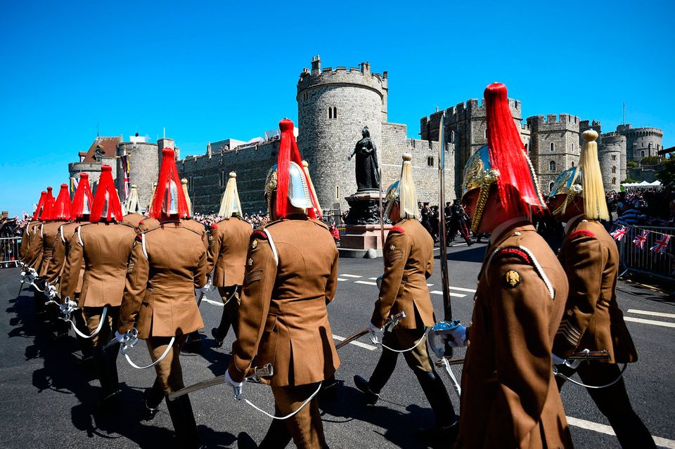 Members of the armed forces head towards Windsor Castle, Berkshire ahead of the wedding of Prince Harry and Meghan Markle this weekend. PRESS ASSOCIATION Photo. Picture date: Thursday May 17, 2018. See PA story ROYAL Wedding. Photo credit should read: Kirsty O'Connor/PA Wire