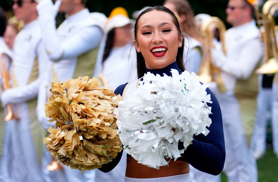 Georgia Tech cheerleaders performing at the Georgia Tech Helluva Block Party Pep Rally in Merrion Square, Dublin, as part of the build up to Saturday’s Aer Lingus College Football Classic, US College football match in Dublin. Photo: Brian Lawless/PA Wire