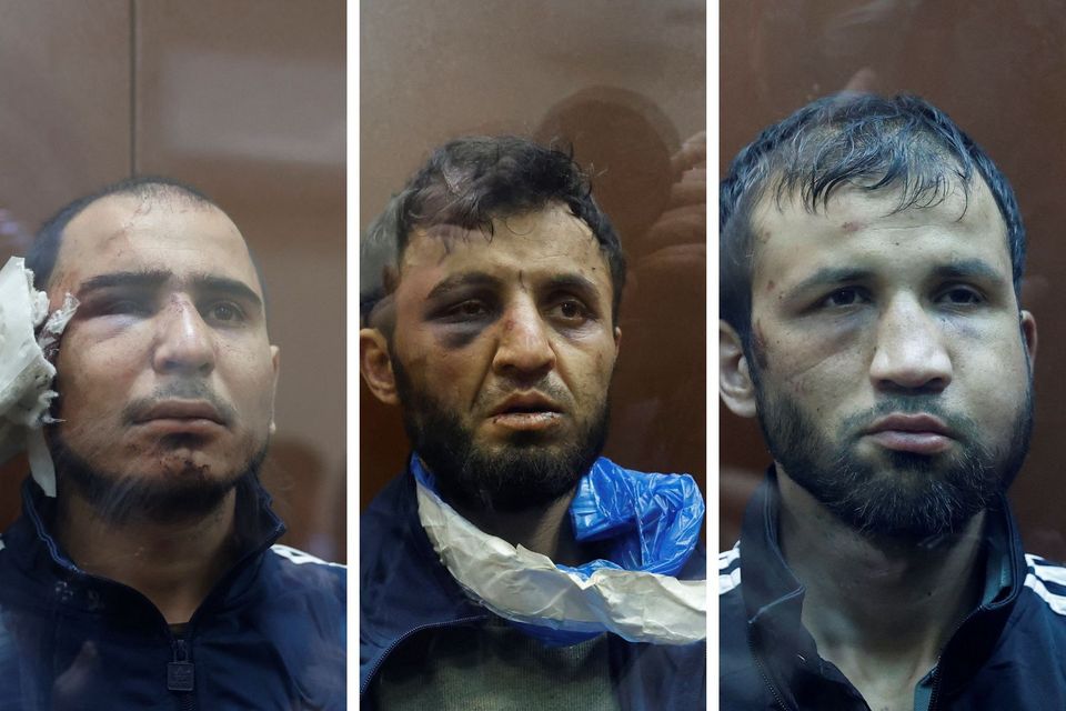 Saidakrami Murodali Rachabalizoda, Dalerdzhon Mirzoyev and Shamsidin Fariduni in court in Moscow today. Photo: Reuters.