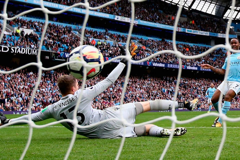 Manchester City’s Raheem Sterling scores his side’s second goal past Wayne Hennessey. Photo: Getty