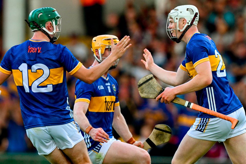 Oisín O'Donoghue of Tipperary celebrates a goal in the 59th minute, with teammate Sam O’Farrell, left, during the All-Ireland SHC quarter-final match at TUS Gaelic Grounds in Limerick. Photo: Ray McManus/Sportsfile