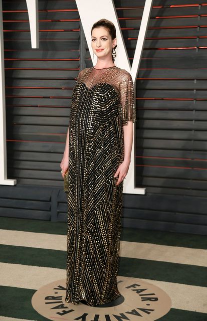Actress Anne Hathaway arrives at the 2016 Vanity Fair Oscar Party: Anne just welcomed her first child - Jonathan Rosebanks Shulman - with husband Adam. She has a Best Supporting Actress Oscar and countless starring roles in hit films over the last 10 years.