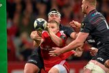thumbnail: Andrew Conway is tackled by Saracens players from left, Jamie George, Kelly Brown and George Kruis. Picture credit: Matt Browne / SPORTSFILE