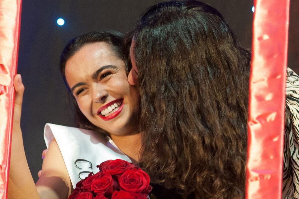 Kelsey gets a kiss from her mother Linda at the Skellig Rose Selection Night. Photo by Christy Riordan