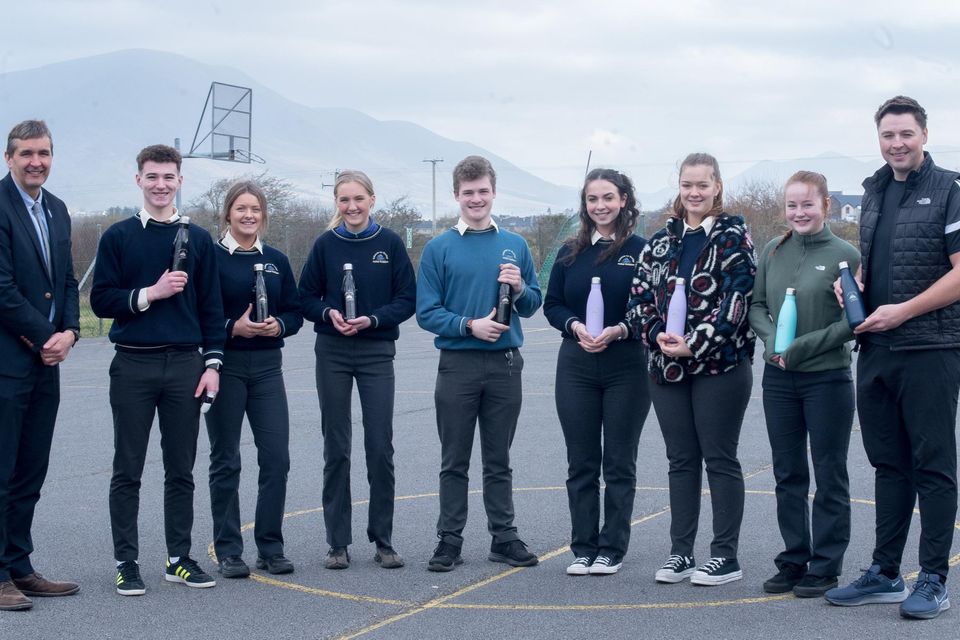 Coláiste na Sceilge Principal Maurice Fitzgerald with students Michael Kavanagh, Lorna O Shea, Marie Donald Cathal Casey, Rebecca O Shea, Muireann Lynch, Sarah O'Shea and teacher Francis Courtney pictured showing off their new Narcissips.com crested reusable water bottles. Photo by Christy Riordan.