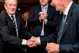 thumbnail: 22 December 2014; Former Dublin player Jimmy Keaveney is congradulated by former RTE commentor, Micheal O Muircheartaigh on his way to be presented with the  Hall of Fame award during the Croke Park Hotel / Irish Independent Sportstar of the Year Luncheon 2014. The Westbury Hotel, Dublin. Picture credit: David Maher / SPORTSFILE