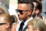 thumbnail: Formula One driver Lewis Hamilton leaves after the funeral ceremony for late Marussia F1 driver Jules Bianchi at the Sainte Reparate Cathedral in Nice, France, July 21, 2015. Bianchi, 25, died in hospital in Nice on Friday, nine months after his crash at Suzuka in Japan and without regaining consciousness.   REUTERS/Jean-Pierre Amet