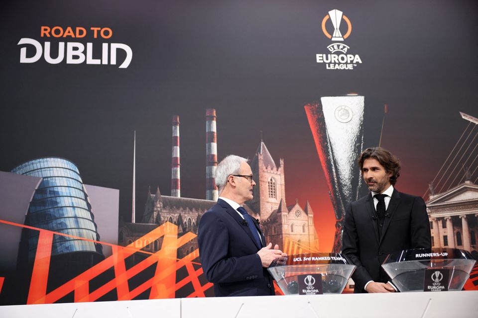 UEFA General Secretary and Director of Football Giorgio Marchetti and former player Julien Escude during the Europa League draw. Photo: Reuters