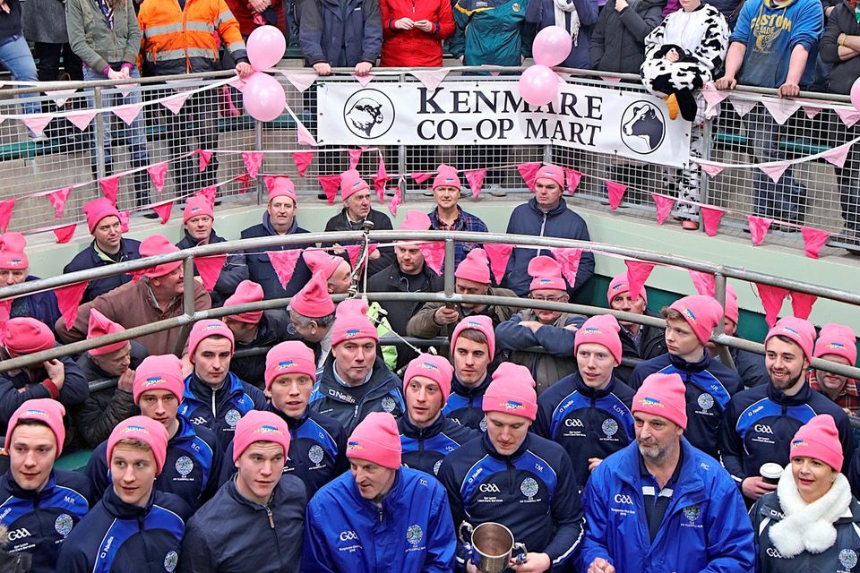 Members of the Templenoe team, which won the All Ireland Junior Football title, were amongh those who helped set a world record of pink-cap wearing at Kenmare Mart when 517 people donned caps in aid of Recovery Haven respite service .Photo: Valerie O'Sullivan.