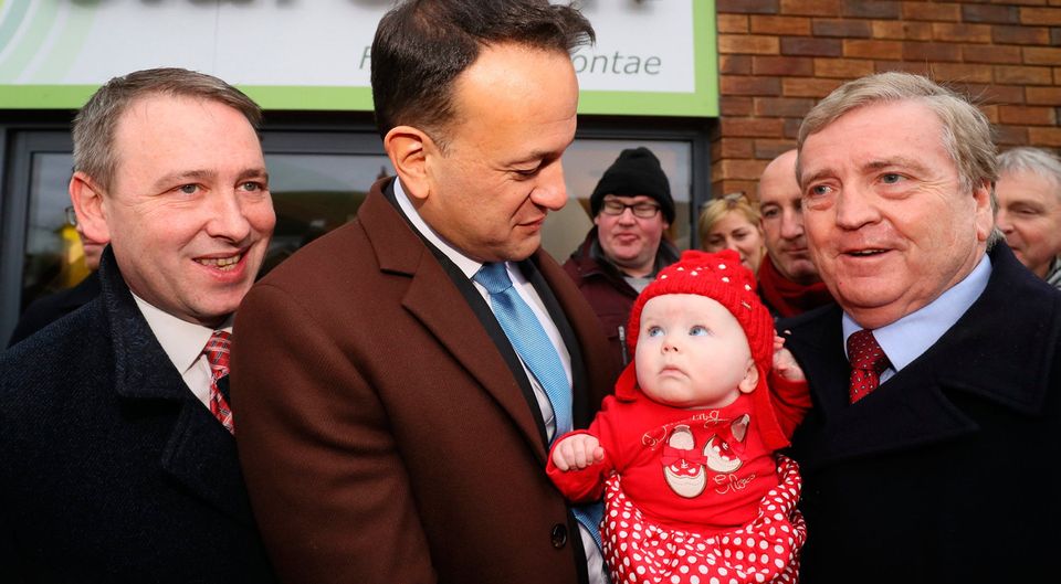 Baby blues: Taoiseach Leo Varadkar with Fine Gael candidates for the Clare constituency, Joe Carey and Pat Breen, holding his eight-month-old grandaughter Aoibhin Breen, outside Clare FM. Picture: PA