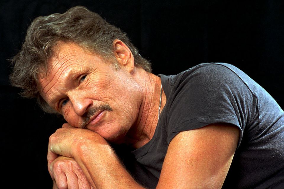 Kris Kristofferson poses for a portrait in Nashville in 1995 (Mark Humphrey/AP)