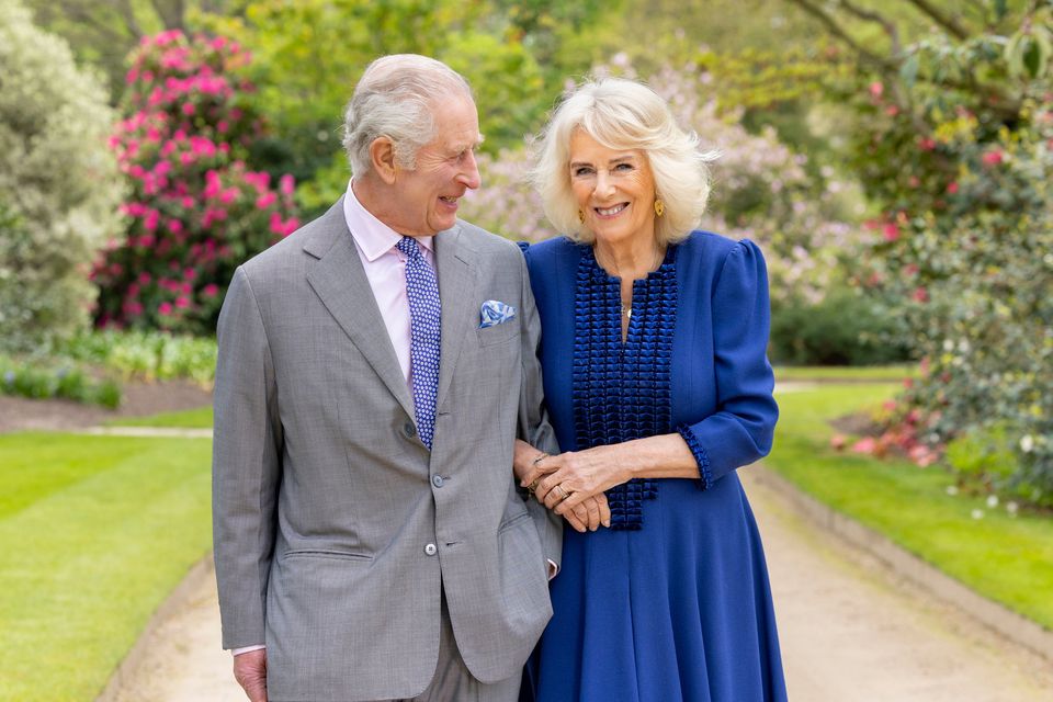 A portrait of Charles and Camilla in the gardens of Buckingham Palace, released to mark the first anniversary of their coronation. Photo: Millie Pilkington/Buckingham Palace