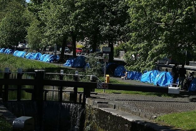 Dublin’s ‘Tent City’: Early morning operation to remove Grand Canal tents completed, situation slammed as ‘inhumane, unsustainable’