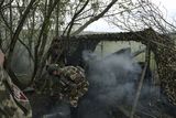 thumbnail: Ukrainian soldiers fire near Bakhmut in the Donetsk region (Libkos/AP)