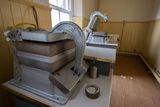 thumbnail: Pressing machines used to make the unleavened wafers for Holy Communion.