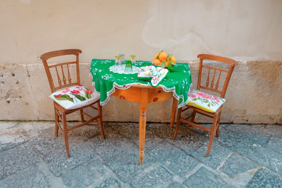 A table for two in Syracuse, Sicily. Photo: Deposit.