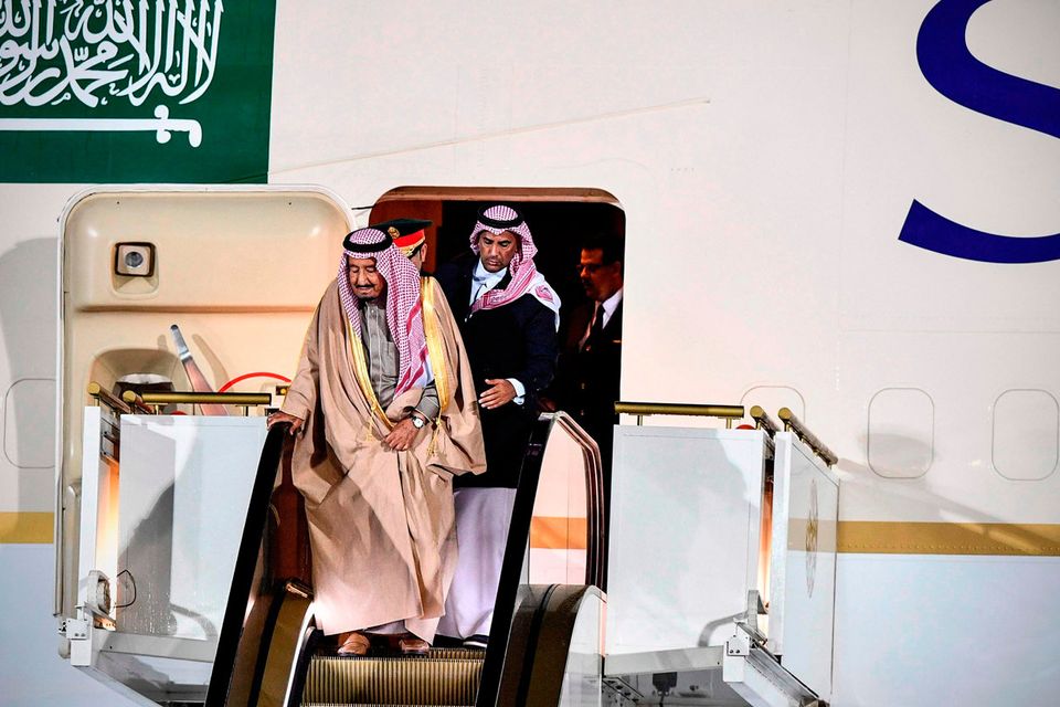Saudi Arabia's King Salman bin Abdulaziz Al Saud gets off the plane upon his arrival at Moscow's Vnukovo Airport on October 4, 2017. / AFP PHOTO / Alexander NEMENOVALEXANDER NEMENOV/AFP/Getty Images