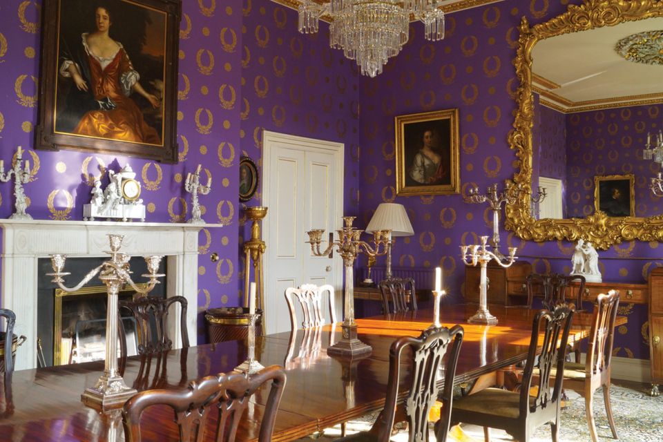 The purple wallpaper in one of the rooms of Capard House
