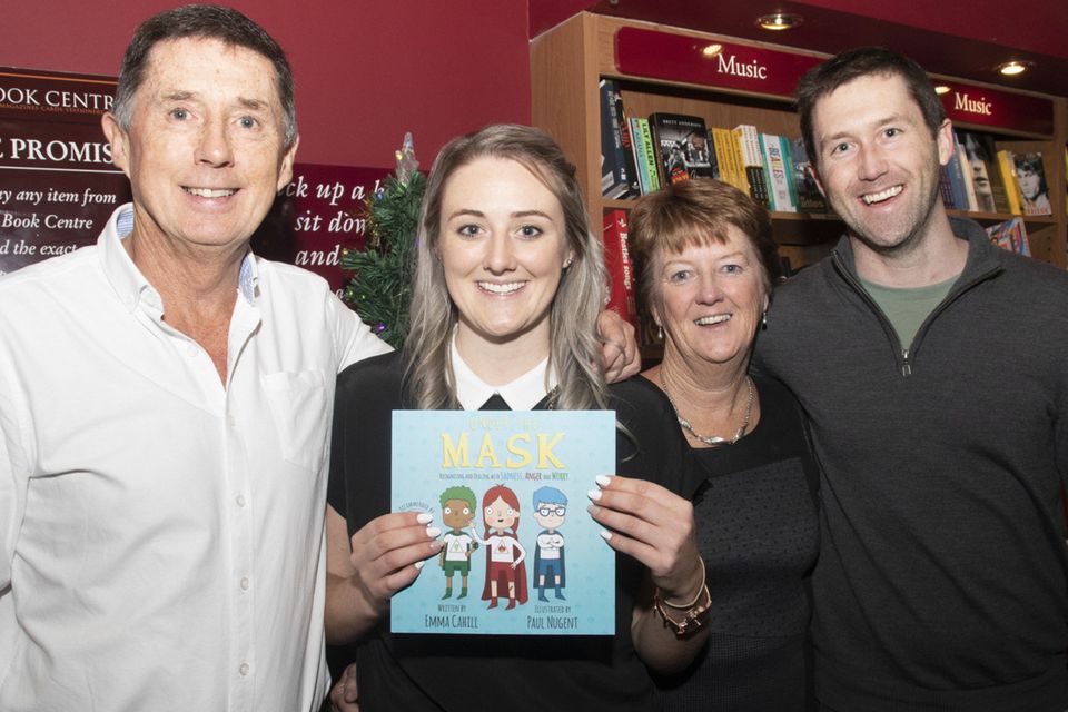 Author Emma Cahill with parents Brian and Geraldine and brother Barry
