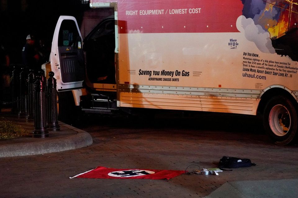 A Nazi flag and other objects recovered from a rented truck that crashed into security barriers at Lafayette Park across from the White House in Washington, U.S. May 23, 2023.   Photo: Reuters/Nathan Howard
