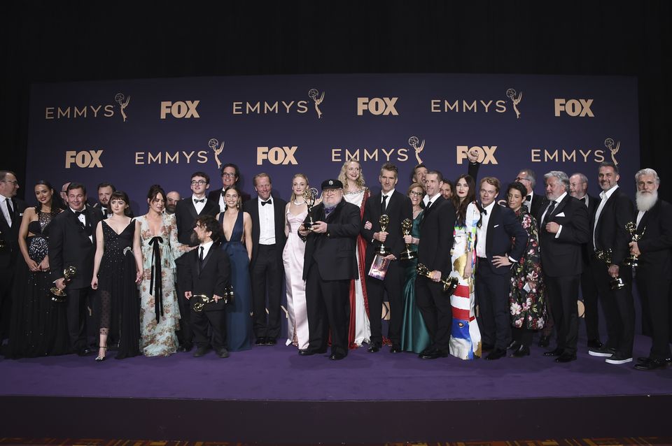 The cast and crew of Game of Thrones after picking up the best drama Emmy (Jordan Strauss/Invision/AP)