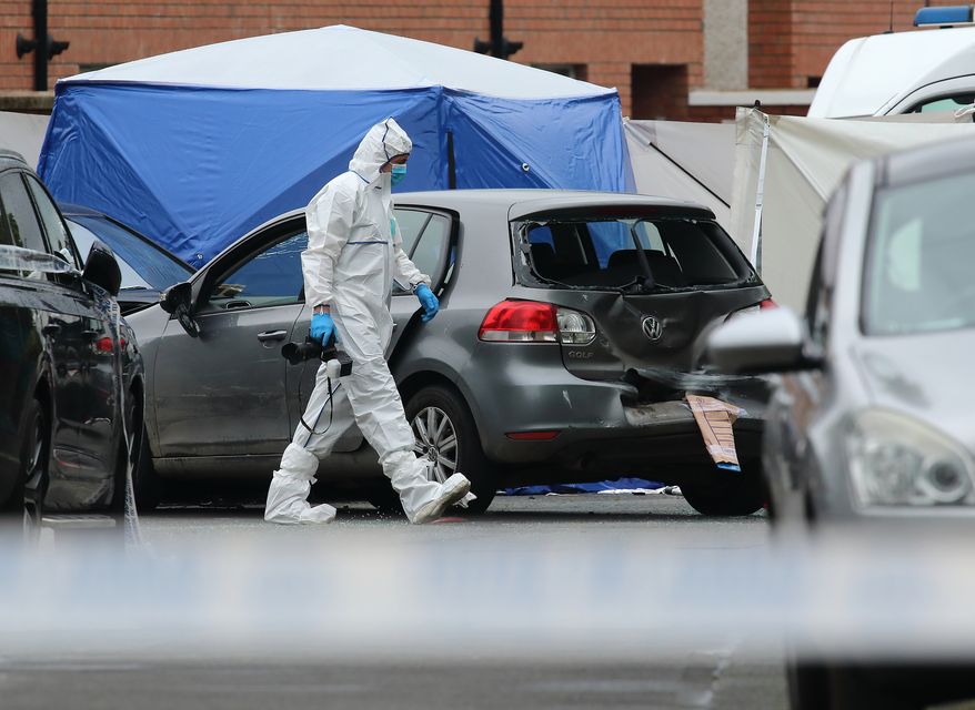 Garda forensics pictured at the scene of the fatal shooting at Knocknarea Road in Drimnagh. Photo: Frank McGrath
