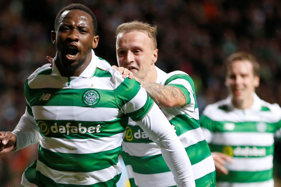 Celtic’s Moussa Dembele celebrates scoring his side’s second goal from a penalty during the Champions League third qualifying round second leg match at Celtic Park, Glasgow last night. Photo: PA