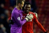 thumbnail: Liverpool's Daniel Sturridge (R) and goalkeeper Simon Mignole embrace after their English Premier League soccer match against West Ham United at Anfield