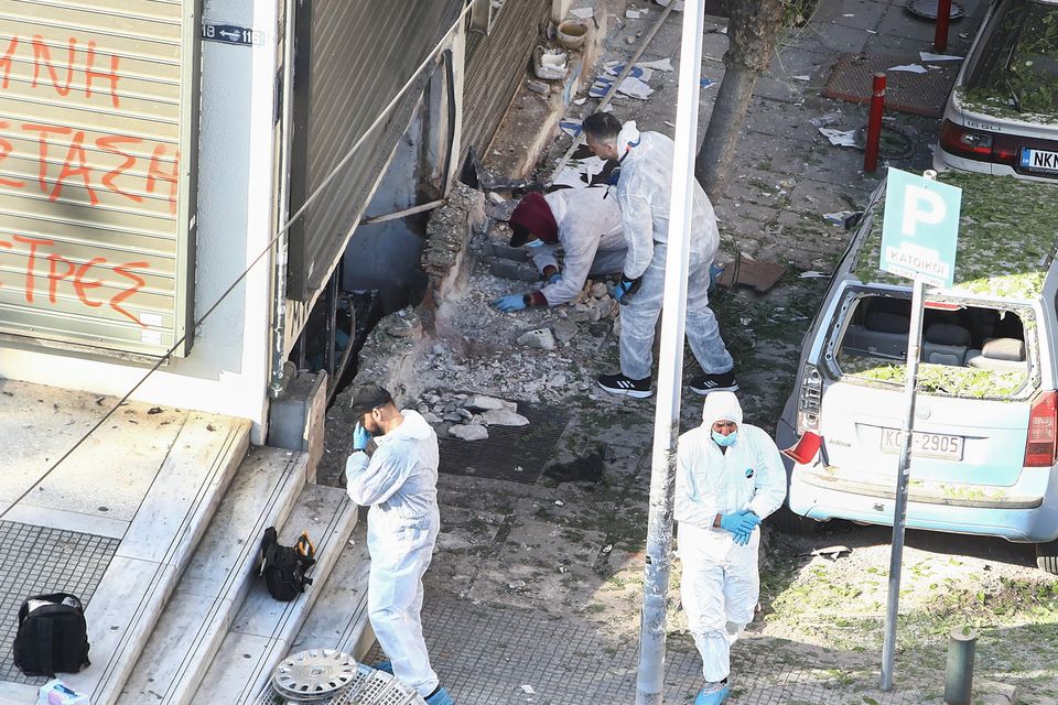 A 38-year-old woman was killed when a bomb she was carrying exploded (Giannis Papanikos/AP)