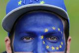 thumbnail: A man with the flag of the European Union painted on his face