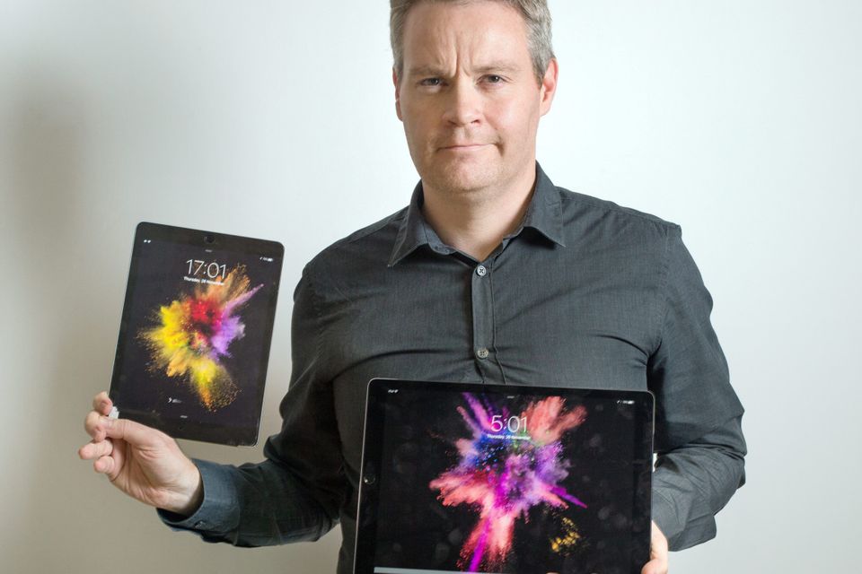 Ronan Price with the new iPad Pro and smaller iPad Air for comparison